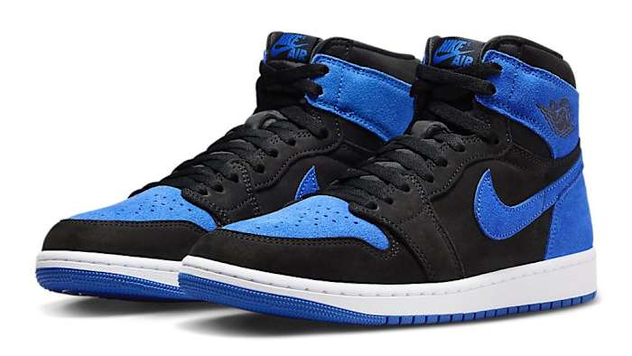 Side view of black and blue Air Jordan sneakers.